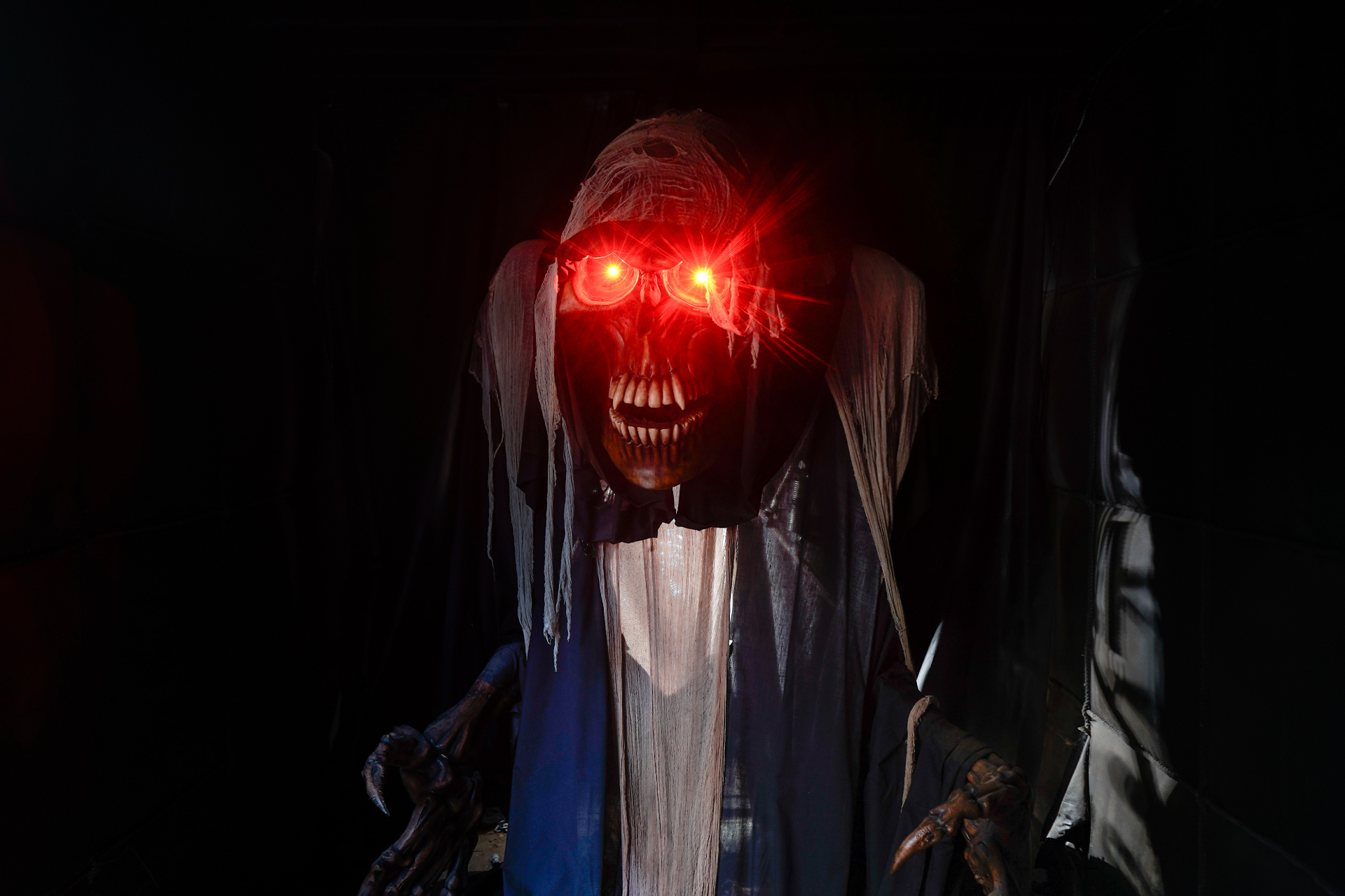 Skull creature with glowing red eyes